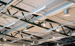 Brightly lit warehouse interior showcasing newly installed LED lighting across the entire facility